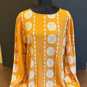 LuLaRoe Vibrant Orange and White Patterned Blouse